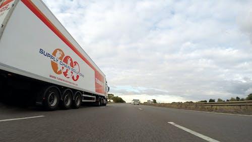 a truck is parked on the side of a road